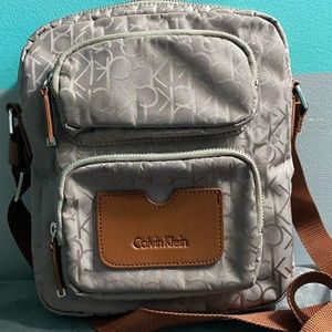 Calvin Klein medium crossbody brown purse.